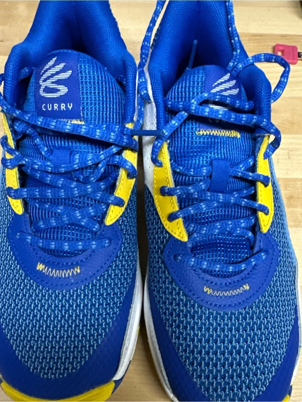 Under Armour Kids Blue, Yellow & White Athletic Sneakers Step Curry’s